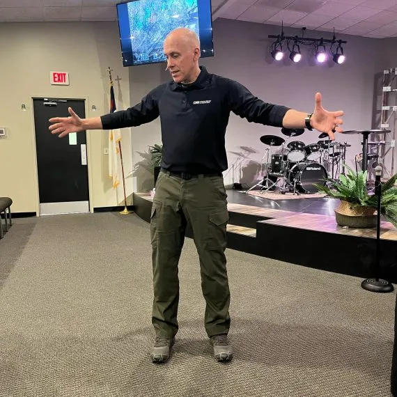 Man gesturing while speaking